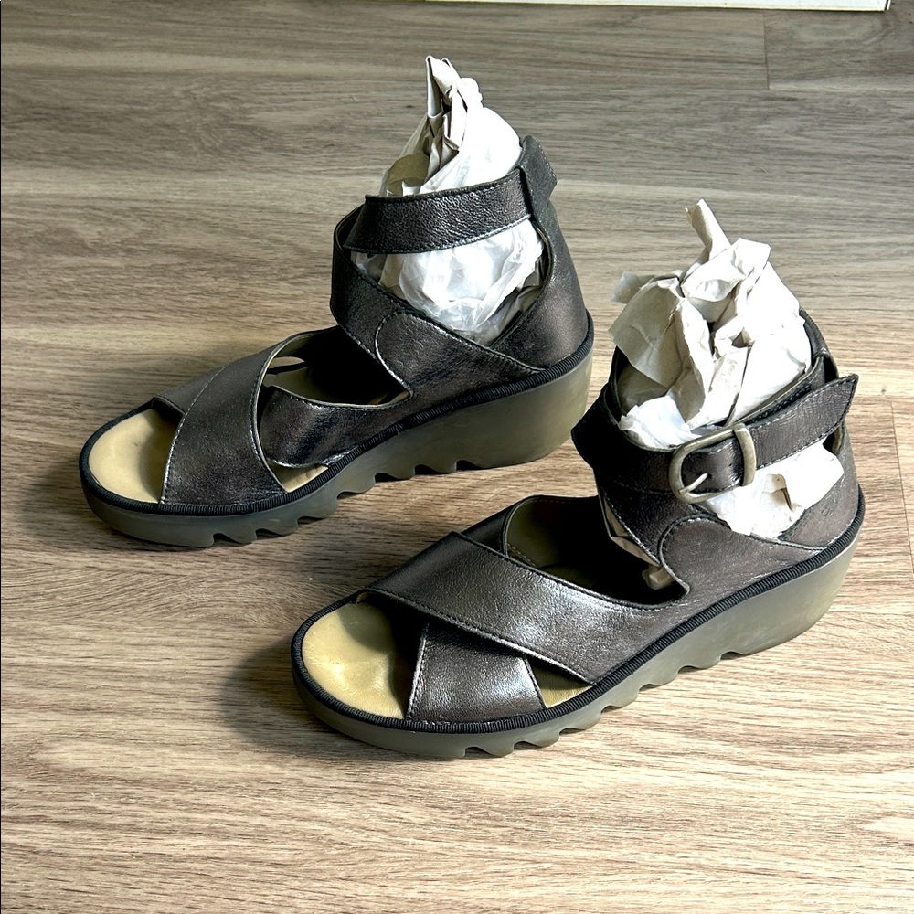 Fly London Metallic Black Wedges